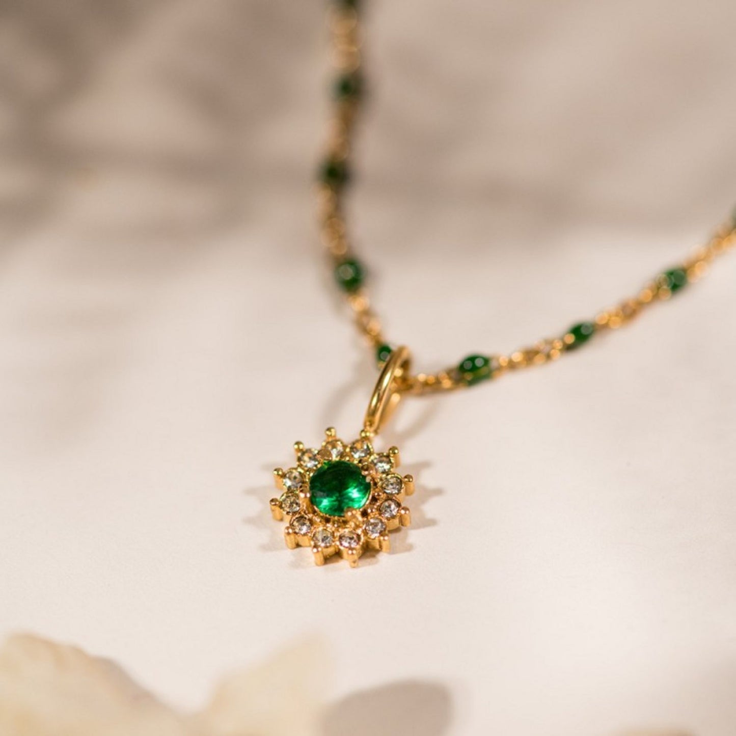 Lucia Emerald Hanger