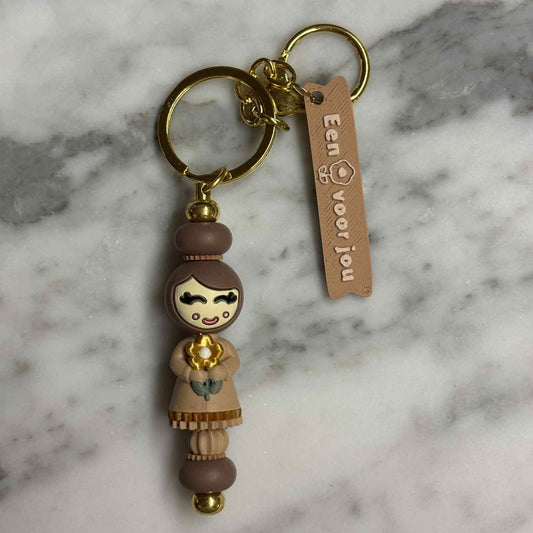 Bloem-gelukspopje Sleutelhanger Bruin